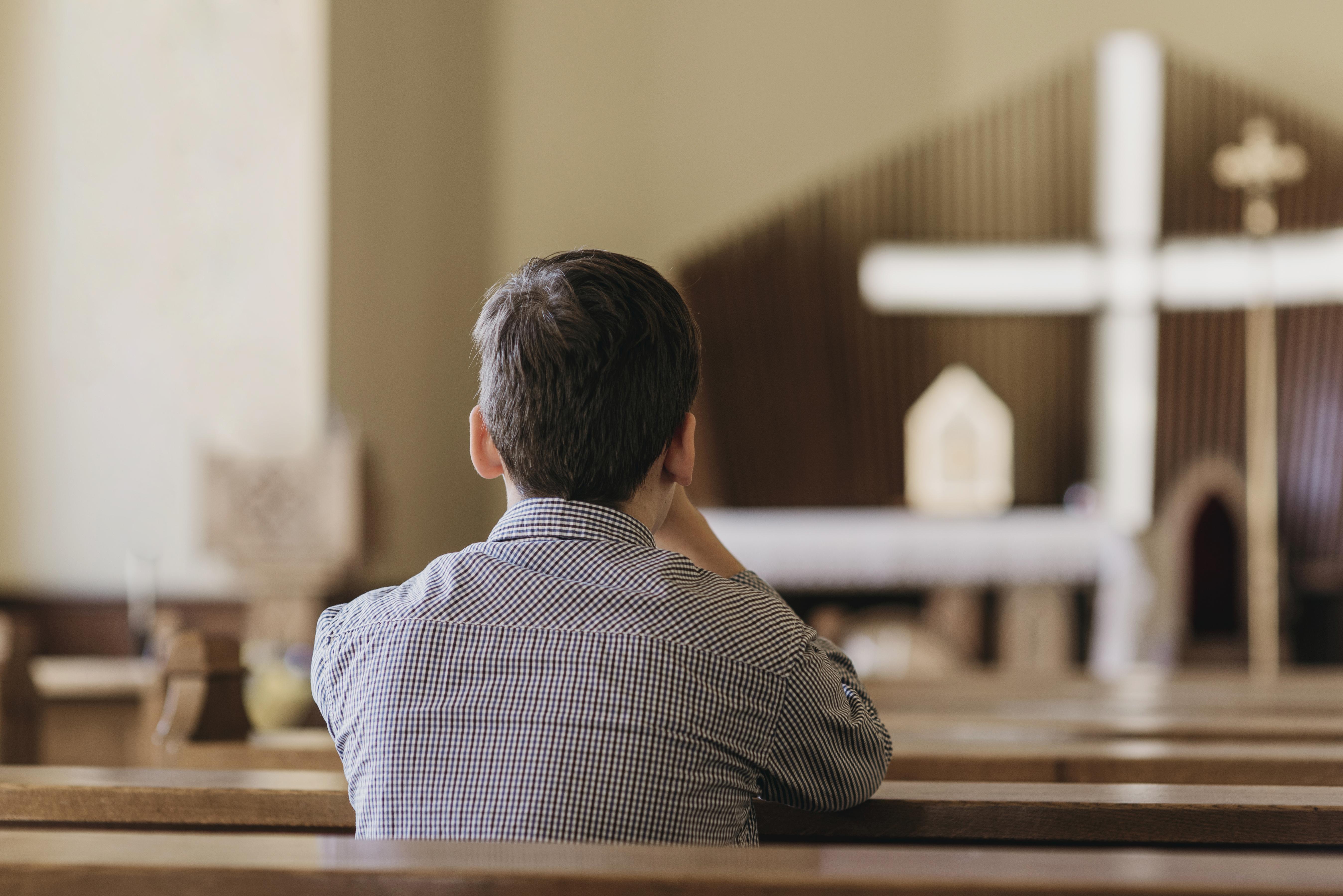 A man praying in the Church
